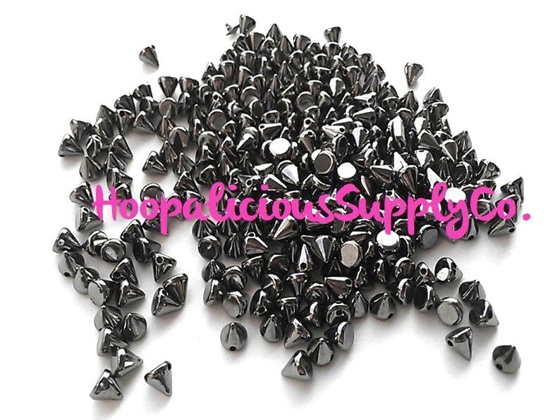 100pc 6mm Morsel Cone Studs. Tiny. Sew or Glue on. Craft Supplies. DIY. T-shirts. Shoes. Jackets. Costumes. We’re in the USA. 5 Star Reviews image 2