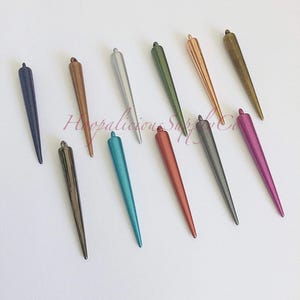 Spike Beads. Choose Finish and Size. High End Supplies. DIY Crafts. T-shirts. Shoes. Jackets. Located in the USA. 5 Star Buyer Reviews.