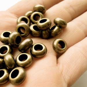 20 DONUT SPACER Beads in Bronze or Silver. Multiple Uses. High Quality. Fast Shipping w/ Tracking for US Buyers.