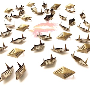50pc Textured Diamond Shaped Prong Nail Head Studs. For DIY Projects. Designers. Crafts. Jackets. We’re in the USA. 5 Star Reviews.