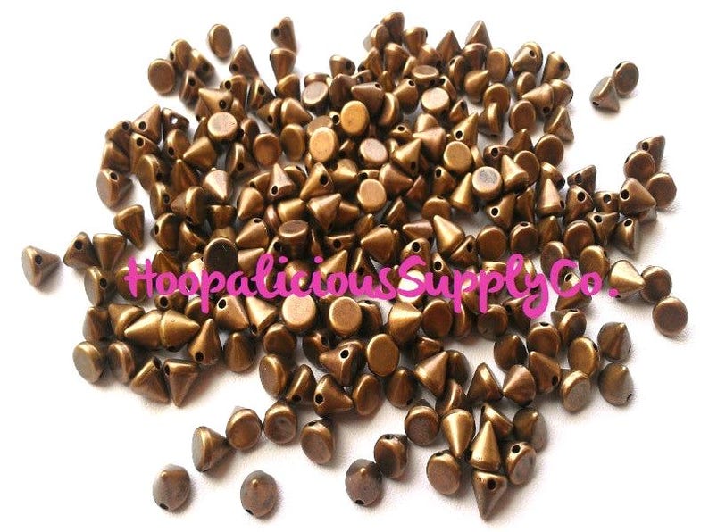 100pc 6mm Morsel Cone Studs. Tiny. Sew or Glue on. Craft Supplies. DIY. T-shirts. Shoes. Jackets. Costumes. We’re in the USA. 5 Star Reviews image 3