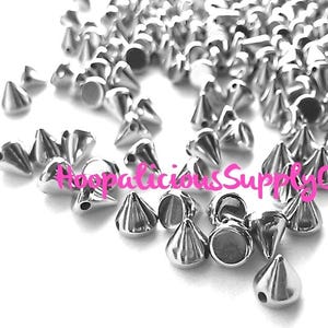 100pc 6mm Morsel Cone Studs. Tiny. Sew or Glue on. Craft Supplies. DIY. T-shirts. Shoes. Jackets. Costumes. We’re in the USA. 5 Star Reviews image 1