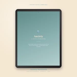 May include: A digital tablet displays a teal-colored screen with the word "Anxiety" and the text "A Gentle Workbook." The image includes the text "Instant Digital Download" at the top and "Anxiety Workbook" at the bottom. The tablet has a black border.