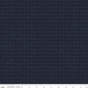 May include: A navy blue fabric with a repeating pattern of small squares containing various camping and outdoor symbols. The fabric is textured and has a slightly distressed look. The fabric is measured in inches.