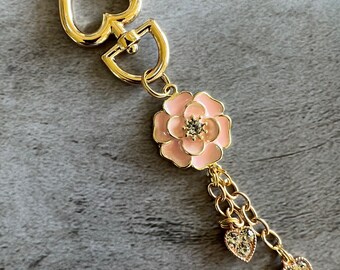 Pink flower with heart charms