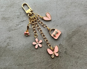 Purse charm with pink charms