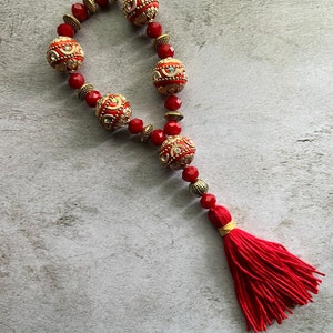 Red beaded tassel for home decor