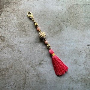 Pink beaded tassel charm