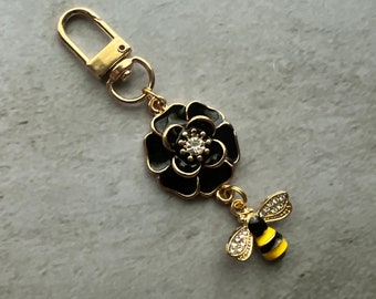 Purse charm black flower dangle with bee charm