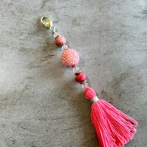 Pink tassel charm