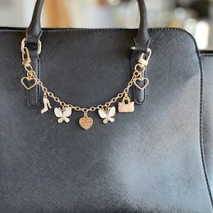 Purse charm with butterflies and heart charms