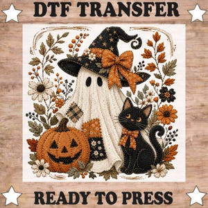 May include: A DTF TRANSFER READY TO PRESS graphic featuring a white ghost wearing a black witch hat with an orange bow, a carved orange pumpkin, and a black cat with an orange bow, surrounded by autumn leaves and flowers in orange and brown.