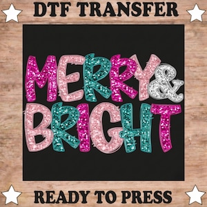 May include: A DTF transfer sheet featuring the text MERRY & BRIGHT in a bold, glittery font. The letters alternate between shades of hot pink, teal, light pink, and silver, set against a solid black background with white stars in the corners.