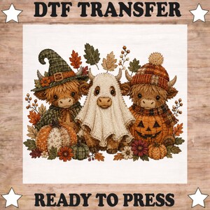May include: A DTF transfer featuring three Highland cows with autumn themes. One wears a green witch hat, one is draped in a white ghost sheet, and one wears a plaid hat. They are surrounded by pumpkins, fall leaves, and flowers. Text reads DTF TRANSFER READY TO PRESS.