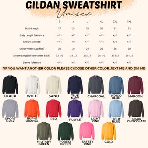 May include: A Gildan unisex sweatshirt size chart with body length, chest width, and sleeve length measurements in inches for sizes S to 3XL. Below the chart are twenty-one color swatches of crewneck sweatshirts labeled by color name.