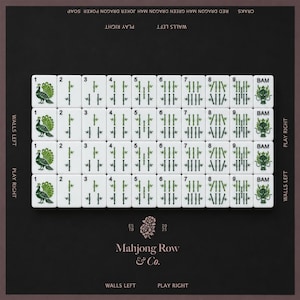 May include: A set of white Mahjong tiles arranged in four rows on a dark background. The tiles feature green bamboo, peacock, and dragon illustrations with black text. The board includes text labels like Walls Left, Play Right, and Mahjong Row & Co.