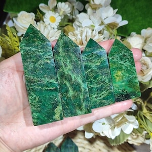 May include: Four polished green crystal points with distinct natural veining and mottled textures. Each stone features a pointed top and a rectangular base, displaying deep emerald and forest green hues with lighter yellow-green mineral inclusions.