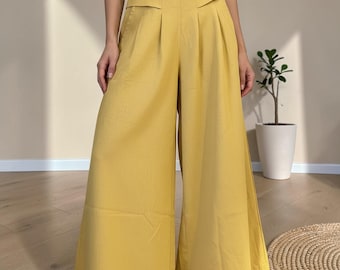 Pantaloni a gamba larga in lino e cotone: pantaloni estivi eleganti e casual a vita alta.