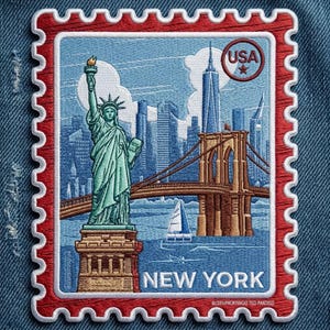 May include: A rectangular embroidered patch shaped like a postage stamp with a red border. It features the Statue of Liberty, the Brooklyn Bridge, and the New York City skyline. The text USA is in a red circle, and NEW YORK is at the bottom.