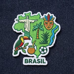 May include: An embroidered patch shaped like the map of Brazil in light green with a white border. It features a toucan, the Christ the Redeemer statue, a palm tree, a colorful carnival mask, a soccer ball, and the word BRASIL in green letters.