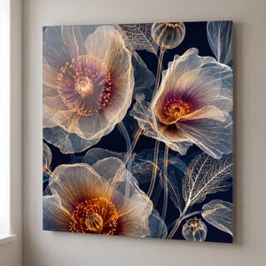 May include: A square wall art print featuring translucent, glowing poppy flowers in shades of amber, gold, and white against a deep navy blue background. The floral composition displays delicate, vein-like textures and intricate petal details.