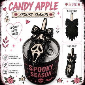 May include: A black and cream-colored plastic can opener shaped like a ghost mask with a bow, featuring a built-in loop for storage. The design includes a ghost face pattern on the bow and a larger ghost face on the main body, shown in use on a soda can.