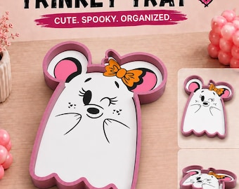 May include: A pink trinket tray shaped like a mouse ghost with a white face, black facial features, and an orange bow. The tray features the text MOUSE GHOST TRINKET TRAY, CUTE. SPOOKY. ORGANIZED., STL FILE READY TO PRINT, and 3MF FILE READY TO PRINT.