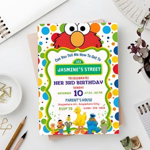 May include: A colorful birthday invitation featuring Elmo and other Sesame Street characters. The invitation includes the text "Jasmine's Street" and details for a 3rd birthday celebration on November 10th at 2:00 PM.