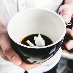 Dragon at the bottom of the coffee mug