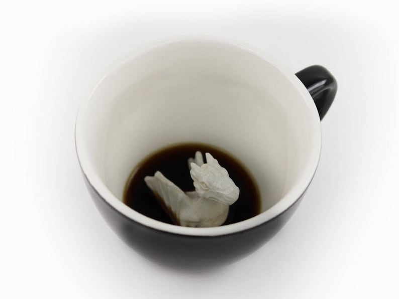 Dragon at the bottom of the coffee mug