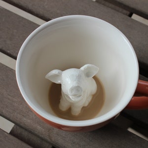 Animal at the bottom of the mug