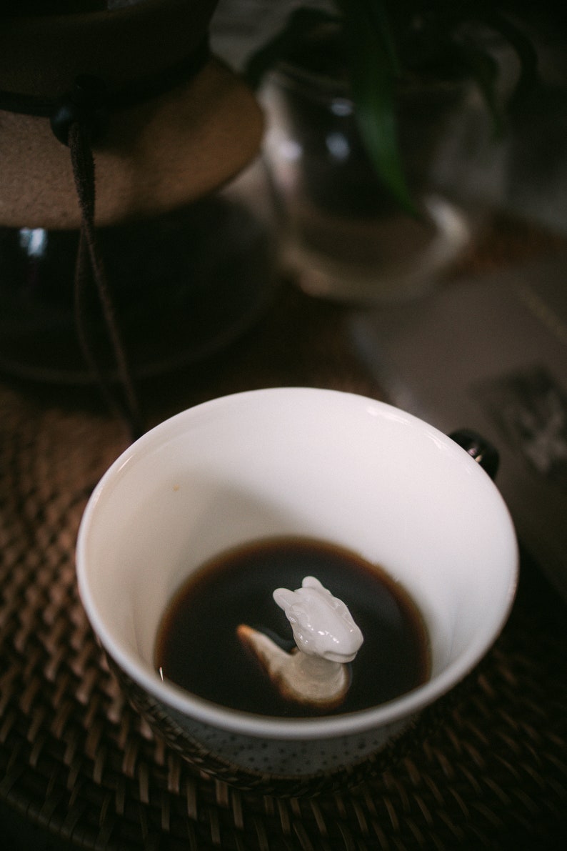 Dragon at the bottom of the coffee mug