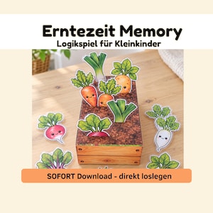 Könnte beinhalten: Ein ausdruckbares Memory-Spiel mit dem Titel Erntezeit Memory Logikspiel für Kleinkinder, bestehend aus einer Papp-Gartenbox mit Schlitzen und verschiedenen ausgeschnittenen Gemüseformen wie Karotten, Lauch und Radieschen mit Gesichtern.