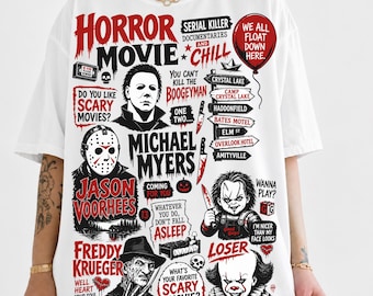 Puede incluir: Una camiseta blanca con un collage de personajes de películas de terror y texto. El diseño incluye a Michael Myers, Jason Voorhees, Freddy Krueger y Chucky, junto con frases icónicas como "Do you like scary movies?" y "We all float down here."