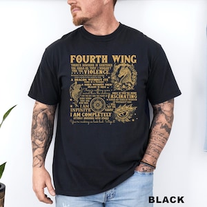 May include: Black t-shirt with gold text and graphics. The text reads "FOURTH WING" and includes phrases like "Violence," "A Dragon Without Its Rider Is A Tragedy," and "I Am Infinite." The shirt also features a dragon illustration.