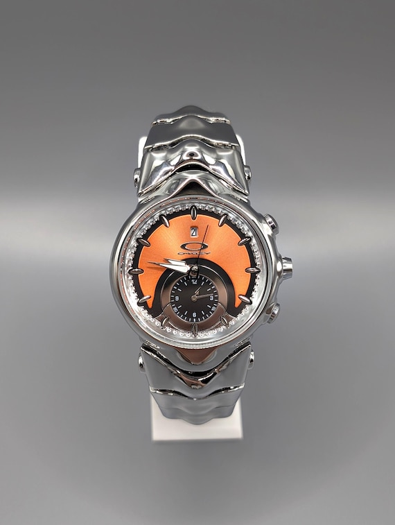 Oakley Judge Watch – Futuristic Design, Orange Dial, Stainless