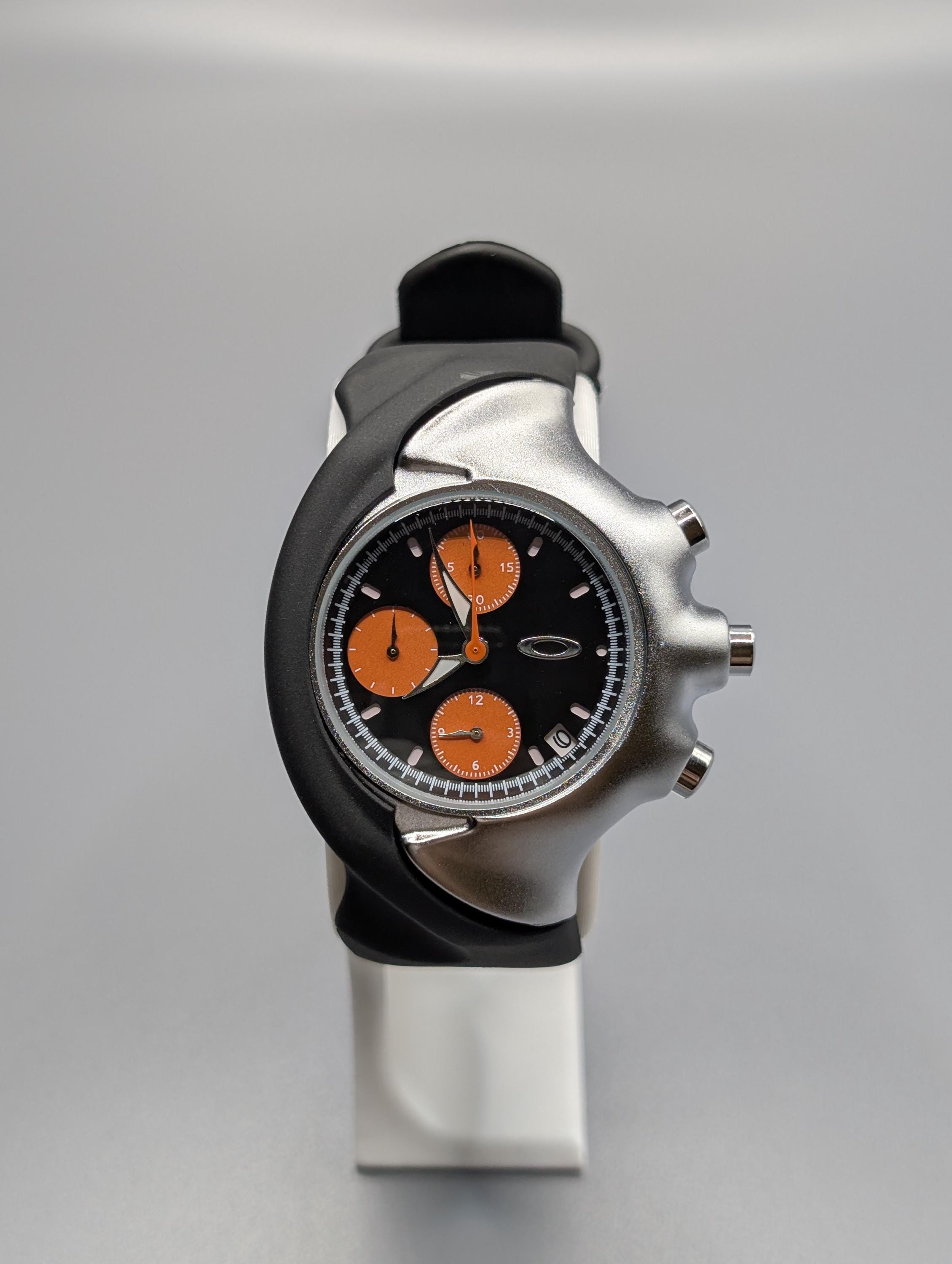 Futuristic Oakley Detonator Watch – Black & Orange Chronograph