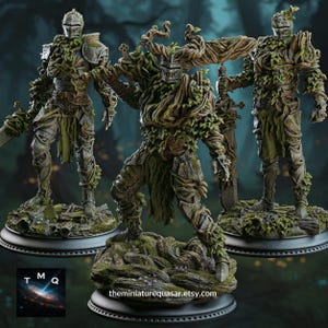 May include: Three detailed fantasy figurines of armored knights, intricately detailed with vines and foliage. Each figure stands on a mossy base, with one in a dynamic pose. The figures are in shades of gray, green, and brown, with swords.