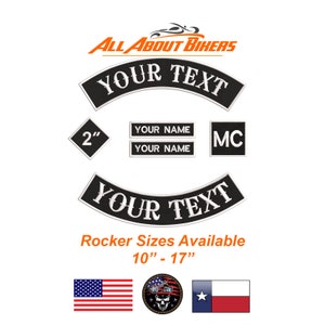 May include: Black embroidered patches with white text, including arched "YOUR TEXT" patches, name bars, and a "MC" patch. A diamond-shaped patch reads "2". The image also shows the American flag, a skull patch, and the Texas flag.