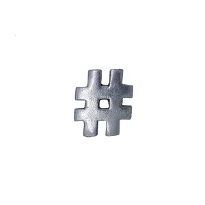 May include: A silver metal charm in the shape of a hashtag symbol.