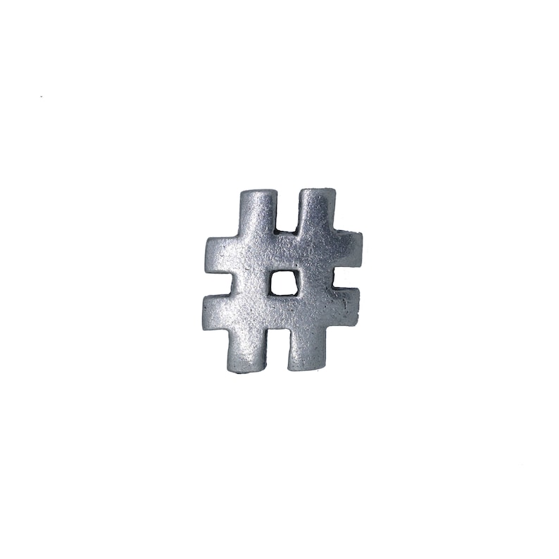 May include: A silver metal charm in the shape of a hashtag symbol.