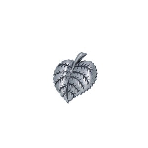 May include: A detailed, silver-colored leaf-shaped decorative object. The leaf has intricate veining and a textured surface, with a stem extending from the top. The object is likely a brooch, pin, or decorative element.
