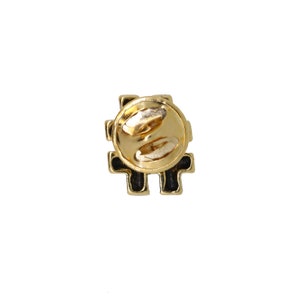 May include: Gold-tone metal pin with a black enamel hashtag design. The back of the pin has a safety clasp.