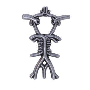 May include: Silver pendant with a stylized human figure design. The figure has a circular head with a decorative top and a body with a ribcage-like pattern. The pendant has a loop at the top for attaching a chain.