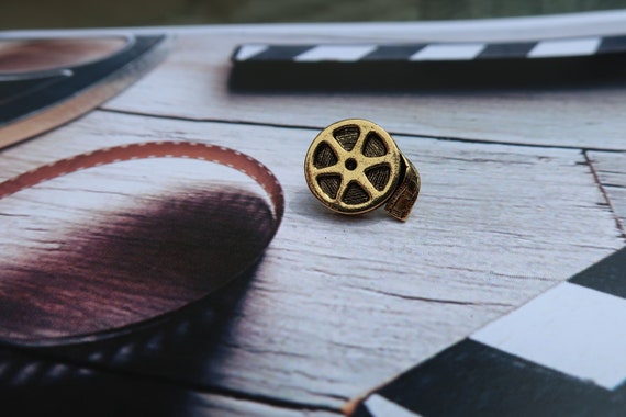 Gold Film Reel Lapel Pin- CC326G- Film, Movies, Motion Picture, Drama, Media, Photography, Cinema, and Photography Lapel Pins