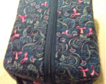 Cosmetic bag with breast cancer print