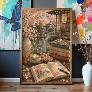 May include: A framed wall art print depicting a serene garden scene with cherry blossoms, a stack of books, a matcha tea bowl, and an open book with a pen. The scene features a Japanese lantern with the text 静かな時間 and a pond with koi fish.