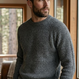 May include: A handmade wooden sign with the text "Welcome to our home" in a handwritten style. The sign is painted white with black lettering and a distressed finish, perfect for home decor.