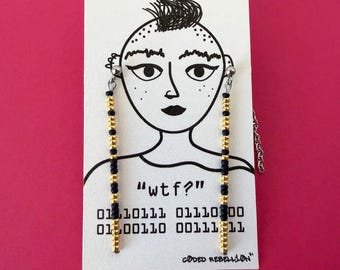 ¿Qué demonios? Pendientes con código binario