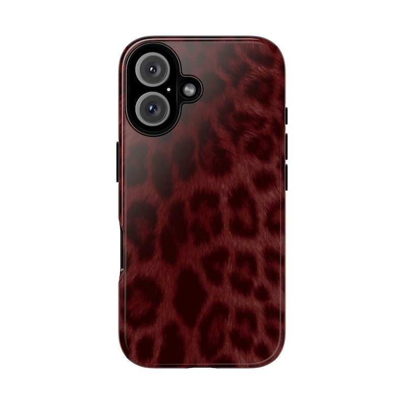 May include: A burgundy phone case with a leopard print design. The case has a glossy finish and features a camera cutout with three lenses. The leopard print pattern is a dark red color.